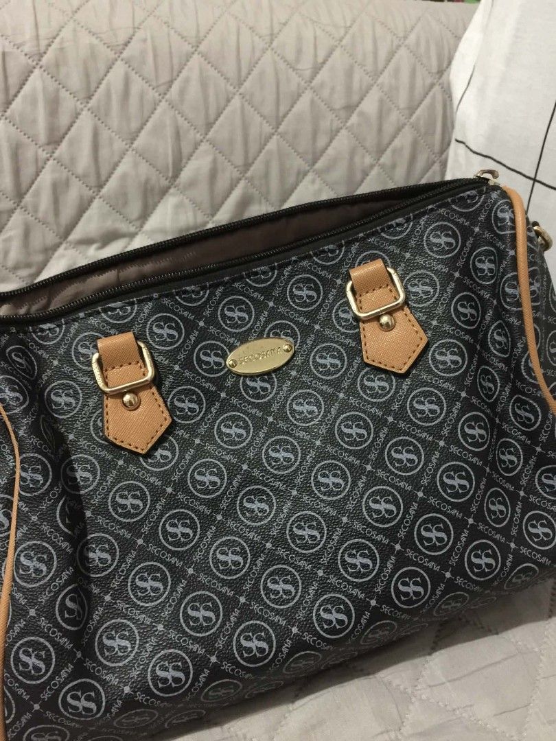 Secosana Black and Brown Shoulder Bag (Category: Shoulder Bags) located in Muntinlupa City. Submitted by prelovedbyanney (Listing ID 1471090245, Image 1). Description: FLAWS ARE SHOWN IN THE PICS (broken strap but i will give black extra strap - Brand: Secosana - Color: Classic black with stylish tan trim and gold-tone hardware - Design: Chic all-over logo pattern with a centered gold metal brand plaque - Compartments: Secure top zipper closure, 