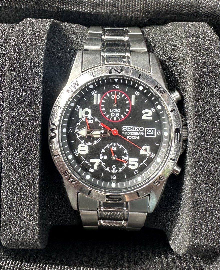Seiko Chronograph 100M Men's Watch (Category: Men's Watches) located in Caloocan City. Submitted by alexandre12 (Listing ID 1470936702, Image 1). Description: - Brand: Seiko Chronograph Watch - Dial: Black dial with clear white numerals and date window at 3 o'clock - Features: Functional chronograph sub-dials and unique compass bezel - Material: Stainless steel case and bracelet with deployment clasp - Movement & Water Resistance: Reliable quartz