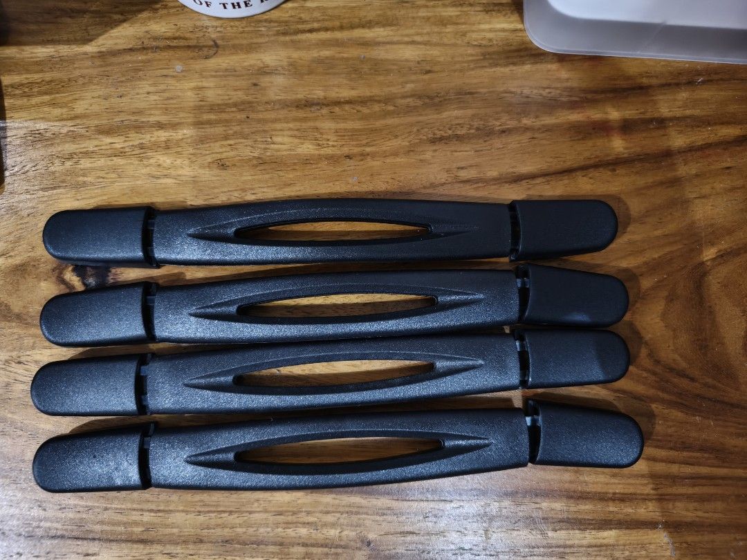 Set of 4 Replacement Black Suitcase Handles (Category: Luggage) located in Bacoor. Submitted by declutterwithme05 (Listing ID 1471055423, Image 2). Description: - Set of 4 black replacement handles for luggage and suitcases - Made of durable solid plastic with reinforced metal mounting brackets at both ends - Ergonomic center cutout grip design for comfortable carrying - Standard mounting hole configuration for easy installation - Clean condition
