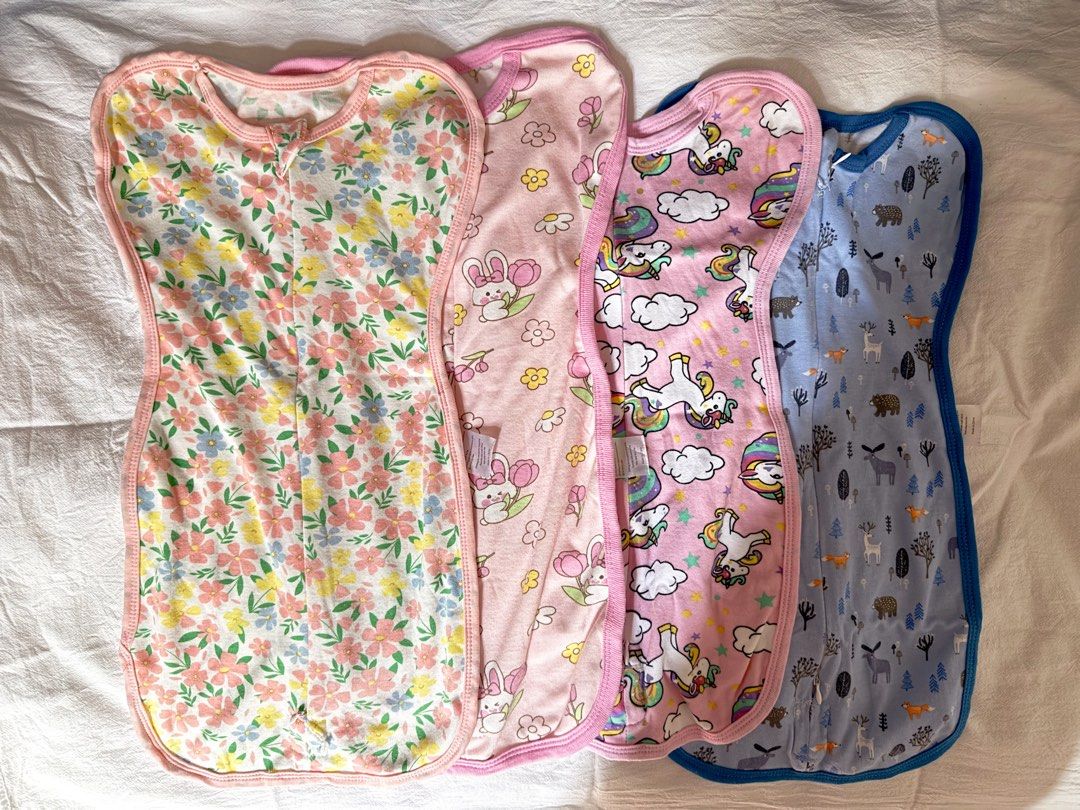 Set of 4 Swaddle Blankets Sleep Sacks (Category: Babies & Kids Fashion) located in Pasig City. Submitted by khaleisi (Listing ID 1470974463, Image 1). Description: - Set of 4 cute prints: floral, bunny, unicorn, and woodland animals (GET ALL FOR 300) - Soft and cozy fabric perfect for newborns - Convenient zip closures for easy changing - Machine washable for hassle-free cleaning - Keeps baby snug and secure all night.