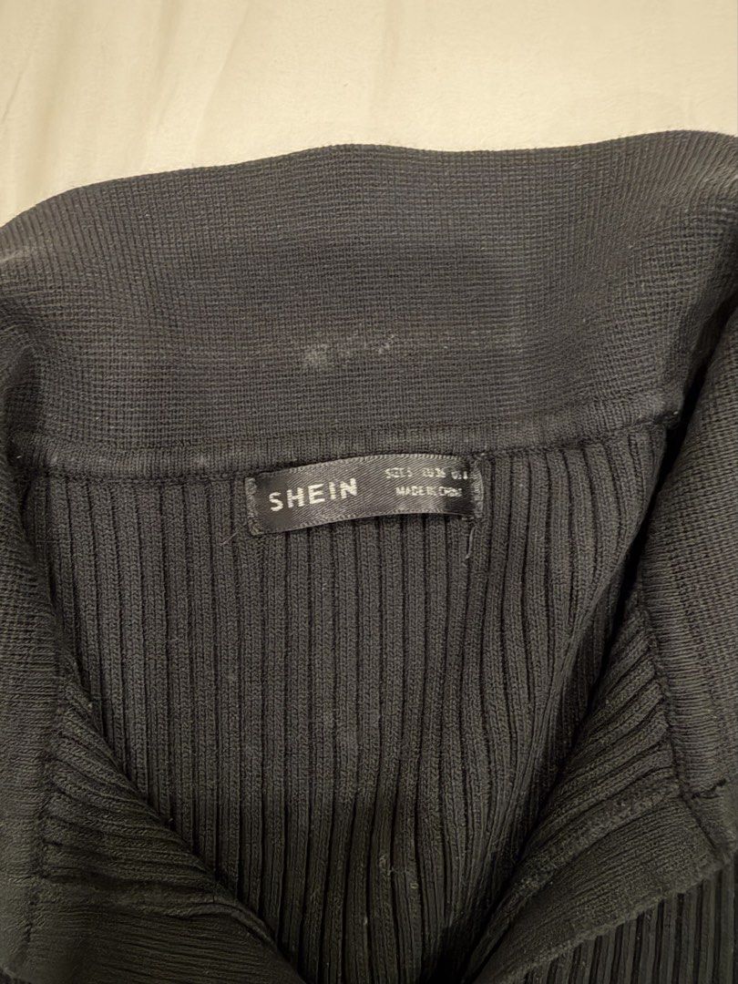 SHEIN Black Ribbed Collar Knit Top (Category: Sleeveless) located in Manila. Submitted by pinkyclothes1267 (Listing ID 1471042729, Image 2). Description: - Brand: SHEIN - Color: Black - Size: S - Material: Stretchy ribbed knit - Fit: Form-fitting - Details: Short sleeves, wide collar, open V-neckline.