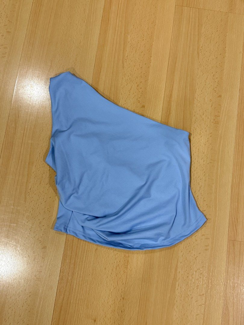 SHEIN Blue One-Shoulder Asymmetrical Top (Category: Sleeveless) located in Muntinlupa City. Submitted by alexisofia (Listing ID 1471084860, Image 2). Description: brand new, never worn/ excellent condition Size: L (EU 40 / US 12 / UK 14) Brand: SHEIN Color: Blue.
