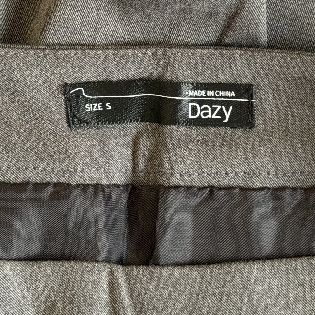 Shein Grey Pleated Skirt (Category: Skirts) located in Cavite. Submitted by kydeclutter (Listing ID 1470998299, Image 2). Description: - Style: Classic skater skirt with front pleats and structured waistband; has shorts inside - Versatile and easy to match with basic tops or jackets - Only worn once!.