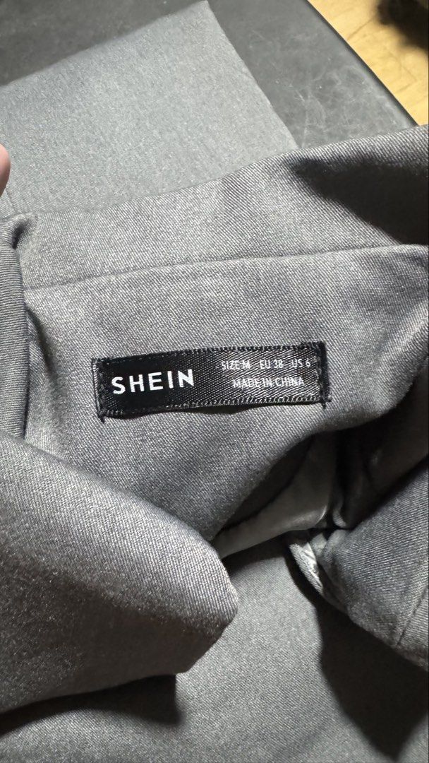 SHEIN Grey Sleeveless Blazer Vest Size M (Category: Sleeveless) located in Manila. Submitted by silverflower_be8728 (Listing ID 1471014122, Image 2). Description: - Brand: SHEIN - Style: Grey sleeveless blazer vest with lapel collar - Size: M (EUR 38, US 6).
