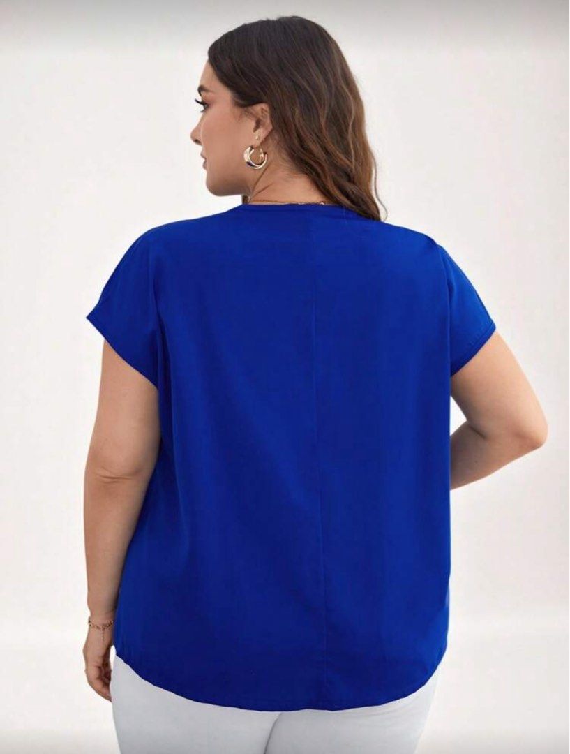 SHEIN Plus Blue Solid Batwing Sleeve Blouse (Category: Blouses) located in Malolos. Submitted by basementbargain (Listing ID 1471059343, Image 2). Description: Size: 0XL Product Measurement: Length: 67.5 cm, Sleeve Length: 26.1 cm, Bust: 122 cm, Cuff: 41.8 cm.