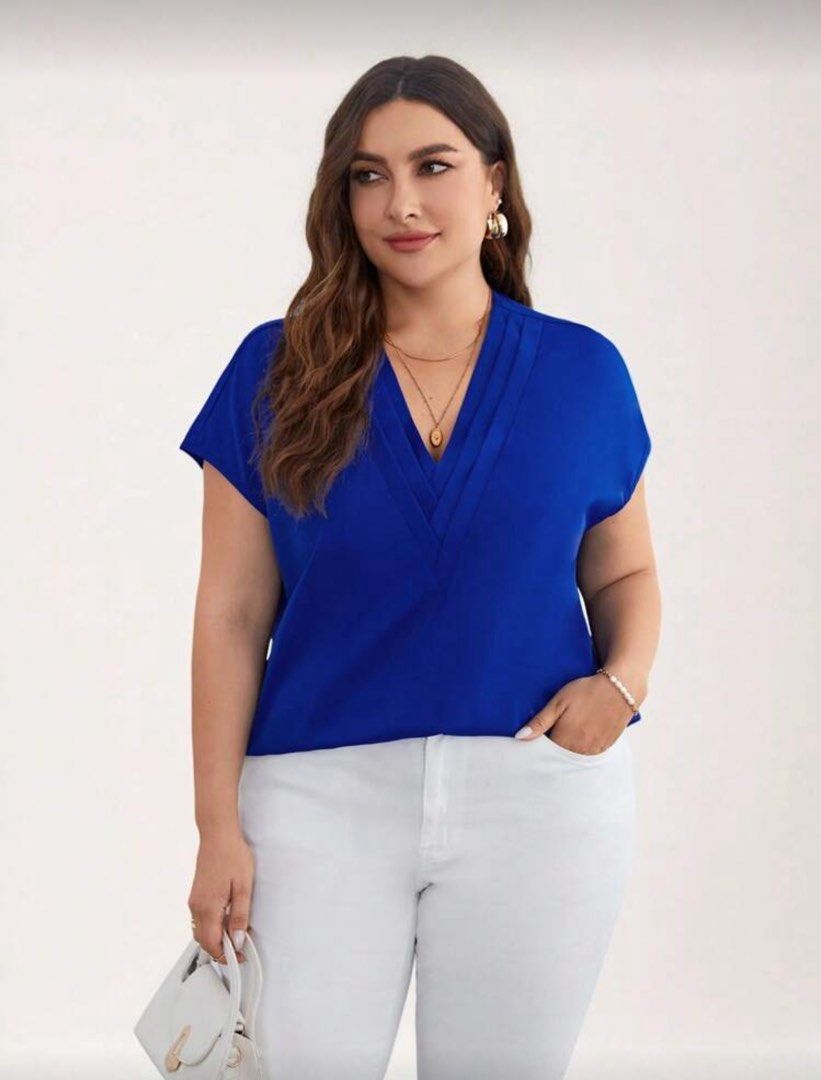 SHEIN Plus Blue Solid Batwing Sleeve Blouse (Category: Blouses) located in Malolos. Submitted by basementbargain (Listing ID 1471059343, Image 3). Description: Size: 0XL Product Measurement: Length: 67.5 cm, Sleeve Length: 26.1 cm, Bust: 122 cm, Cuff: 41.8 cm.