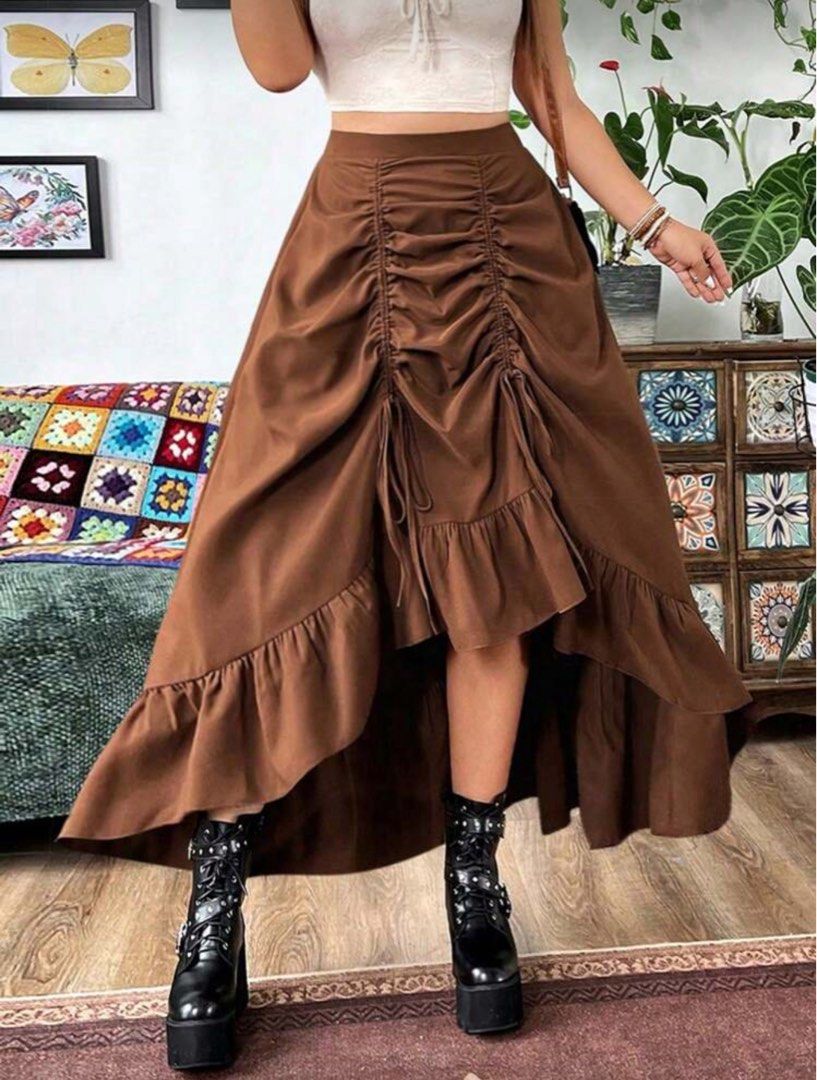 Shein Plus Size Brown Skirt (Category: Skirts) located in Malolos. Submitted by basementbargain (Listing ID 1471055905, Image 1). Description: Size: 1XL Product Measurement: Length: 95 cm Waist Size: 90-124 cm Never worn.