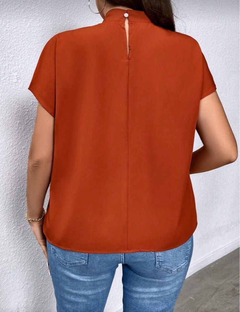 Shein Plus Size Twisted Batwing Short Sleeve Shirt (Category: Blouses) located in Malolos. Submitted by basementbargain (Listing ID 1471060261, Image 2). Description: Size: 0XL Product Measurement: Length: 66.5 cm, Bust: 118 cm, Cuff: 46.8 cm.