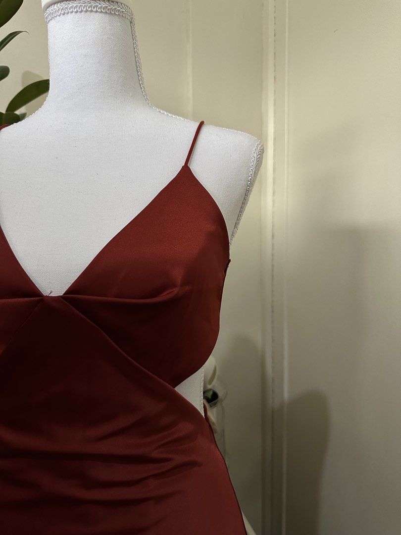 Shein Red Cutout Maxi Dress with Back Bow (Category: Dresses) located in Antipolo. Submitted by wxyz9876 (Listing ID 1471057090, Image 2). Description: - Brand/Style: Shein satin maxi dress - Color: Gorgeous maroon red - Size: XS to S - Material: Smooth fabric with a lovely drape - Condition: Worn twice, stored properly Perfect for xmas parties!! Dm me for when worn!.