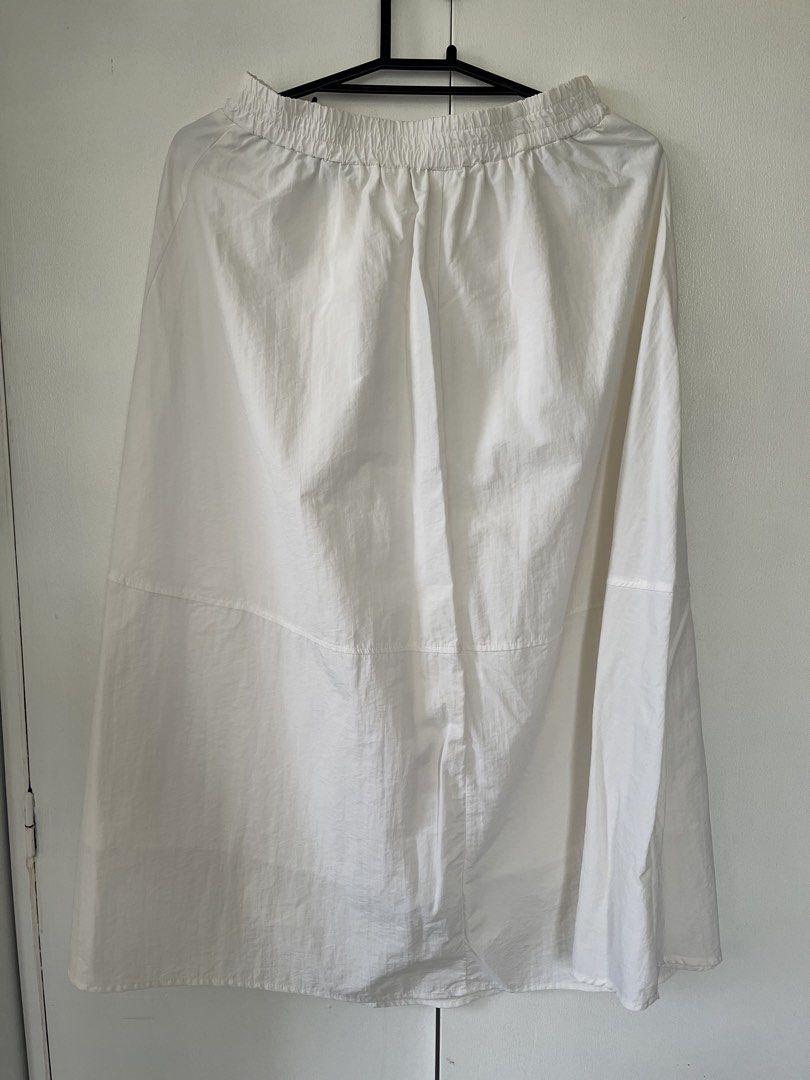 SHEIN White Midi Skirt (Category: Skirts) located in Cebu City. Submitted by stylebyregi (Listing ID 1470970789, Image 2). Description: No issues, can pass as like new Size will fit til large Very flattering fit Length calf area if youre 5’2.
