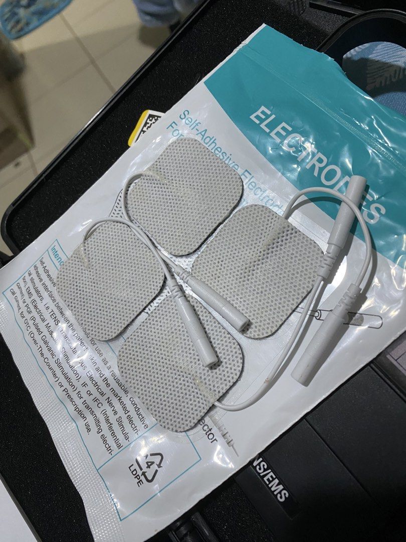 Shenzhen Roundwhale Combo Electrotherapy Device R-C101F TENS/EMS (Category: Medical Supplies & Tools) located in Cebu City. Submitted by greatdeal.e6c8cf (Listing ID 1471009016, Image 3). Description: Shenzhen Roundwhale combo electrotherapy device, model R-C101F. TENS and EMS functions for muscle stimulation and pain relief. Includes: main unit, lead wires, reusable self-adhesive electrode pads, instruction manual, and hard carrying case with ha