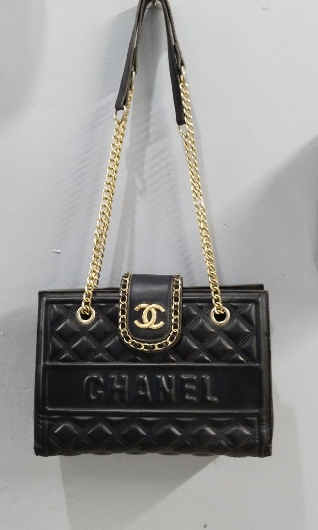 Shoulder / sling bag (Category: Cross-body Bags) located in Trece Martires City. Submitted by vherma (Listing ID 1470965921, Image 2). Description: black quilted leather shoulder bag featuring a gold-tone CC turn-lock closure and gold chain-link shoulder straps..