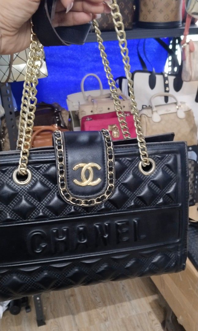 Shoulder / sling bag (Category: Cross-body Bags) located in Trece Martires City. Submitted by vherma (Listing ID 1470965921, Image 3). Description: black quilted leather shoulder bag featuring a gold-tone CC turn-lock closure and gold chain-link shoulder straps..