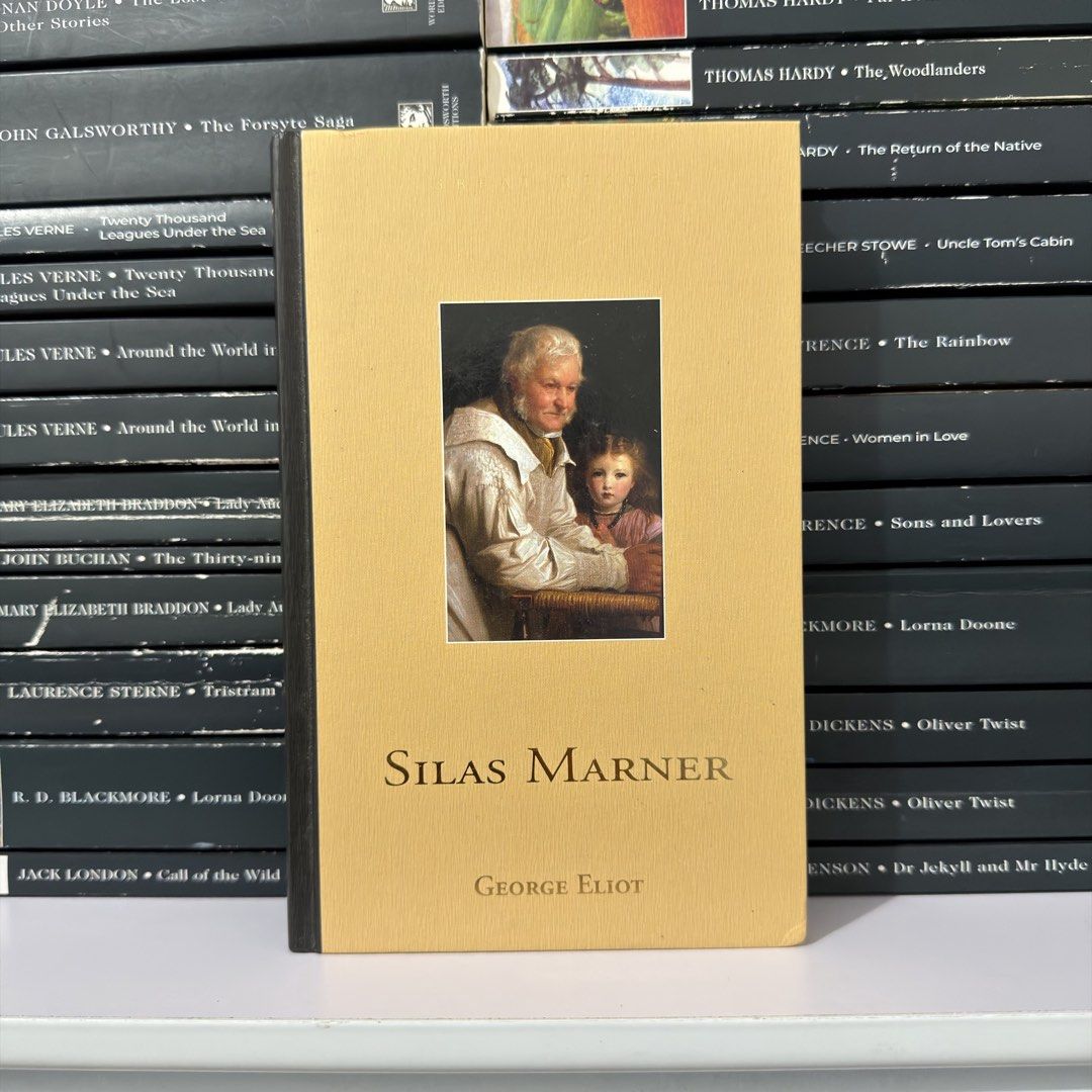 Silas Marner by George Eliot Paperback (Category: Storybooks) located in Lingayen. Submitted by readwjane (Listing ID 1471071438, Image 1). Description: - Title: Silas Marner - Author: George Eliot - Format: Paperback - Condition: Clean exterior surface - Design: Yellow cover with inset painting of an older man and young girl, accented with a black spine and borders - Perfect for: Literature fans and students building their bookshelf.