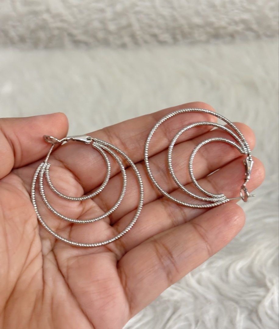 Silver-toned multi-hoop earrings (Category: Earrings) located in Paranaque City. Submitted by dalle_closet (Listing ID 1470990403, Image 3). Description: .