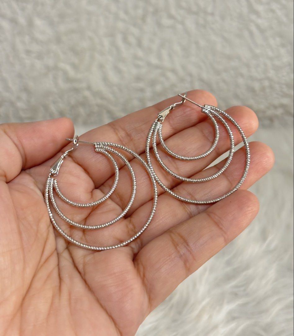Silver-toned multi-hoop earrings (Category: Earrings) located in Paranaque City. Submitted by dalle_closet (Listing ID 1470990403, Image 2). Description: .