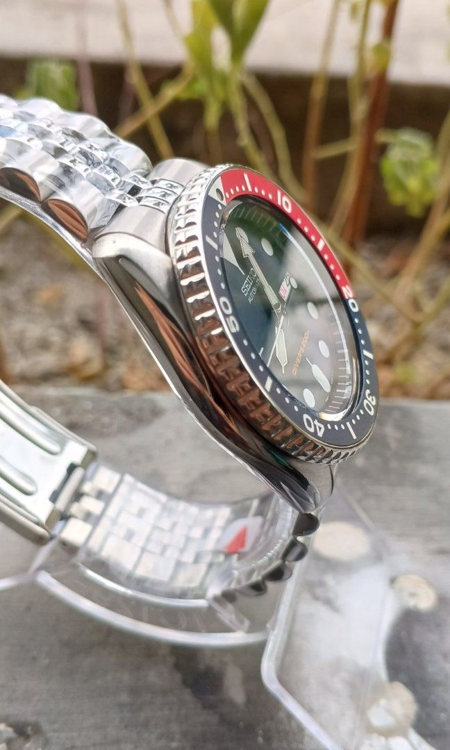 Skx009 (Category: Luxury Watches) located in Calamba. Submitted by timekeepingwatchrepair_9d3e9d (Listing ID 1470938248, Image 3). Description: Seiko skx 009 original bezel insert dial hands overhaul buffing case after market jubilee bracelet solid links.