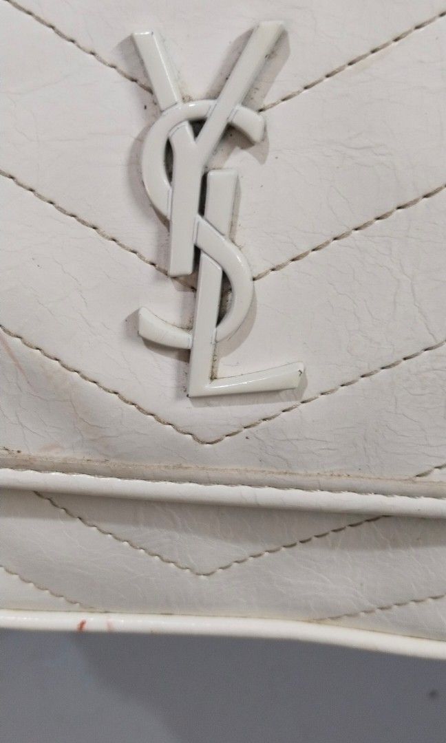 Sling / shoulder bag (Category: Cross-body Bags) located in Trece Martires City. Submitted by vherma (Listing ID 1470959940, Image 3). Description: white crinkled leather Saint Laurent Niki shoulder bag featuring chevron stitching, a tonal YSL logo plaque, and a chain-link strap..