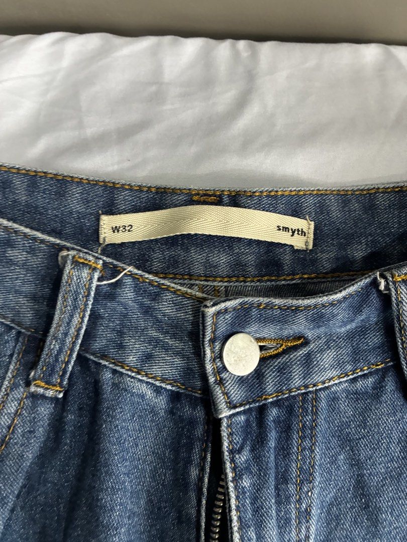 Smyth Blue Denim Jeans W32 (Category: Jeans) located in Manila. Submitted by nikkoour (Listing ID 1470934511, Image 2). Description: - Brand/Item: Smyth blue denim jeans - Size: W32 - Fit: Classic straight leg, comfortable for everyday casual wear - Wash/Design: Medium wash with contrast stitching - Features: Standard button and zip fly, front pockets, and two back patch pockets - Condition: Clean overall with minimal wear -negotiable.