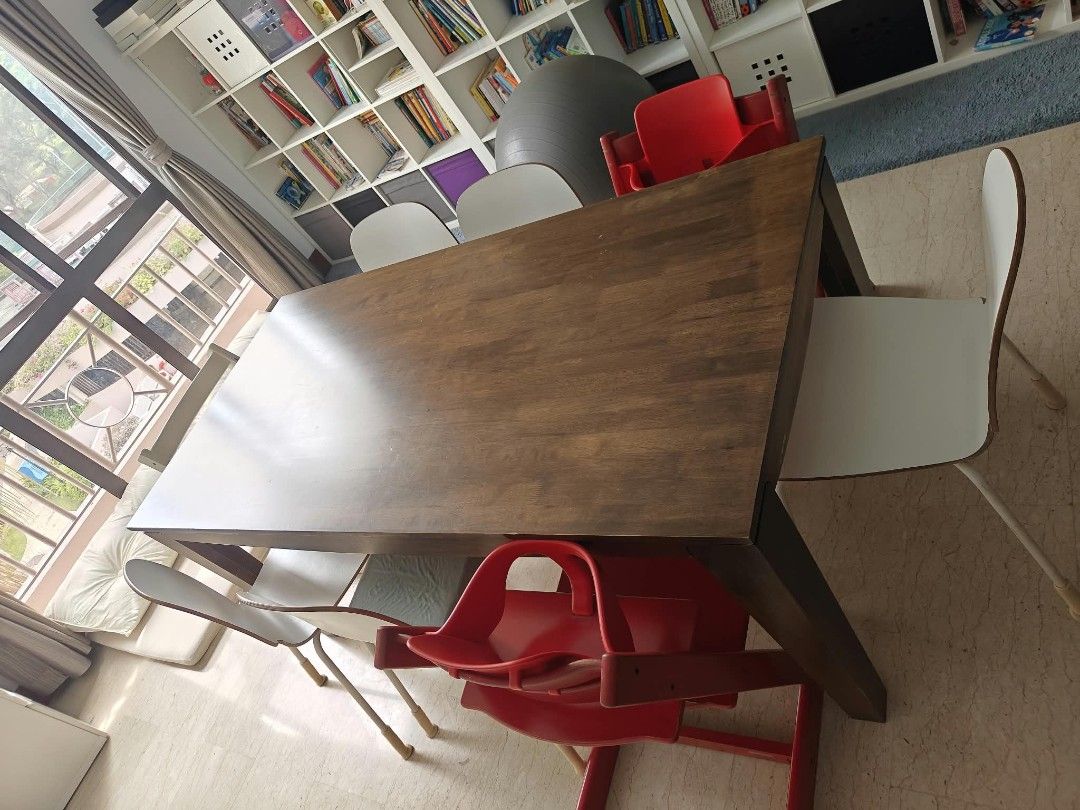 Large Solid wood dining table (Category: Tables & Sets) located in Singapore. Submitted by franziskapaul (Listing ID 1471024418, Image 2). Description: - Sturdy dark wood dining table - no chairs! - Solid, heavy construction built to last - Seats a big family comfortably with a roomy surface for meals and projects - Easy to wipe clean - Normal scuffs and marks on the tabletop from daily use - about 180*90 cm.