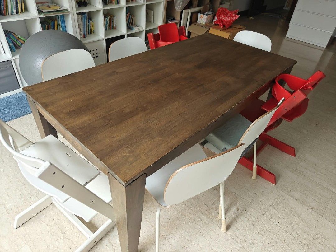 Large Solid wood dining table (Category: Tables & Sets) located in Singapore. Submitted by franziskapaul (Listing ID 1471024418, Image 1). Description: - Sturdy dark wood dining table - no chairs! - Solid, heavy construction built to last - Seats a big family comfortably with a roomy surface for meals and projects - Easy to wipe clean - Normal scuffs and marks on the tabletop from daily use - about 180*90 cm.