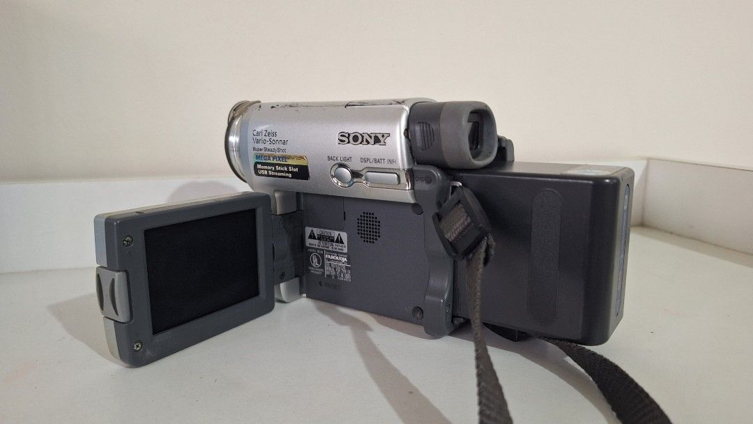 Sony Handycam Mini DV Digital Camcorder (Category: Video Cameras) located in Angeles City. Submitted by pamdiel003 (Listing ID 1470959640, Image 2). Description: Sony Handycam MiniDV – Vintage/Y2K 📹 • Sony Digital Handycam with Carl Zeiss Vario-Sonnar lens • MiniDV format + Memory Stick • Super SteadyShot + USB Streaming • Original carrying case included • Original batteries included • Original charger included • Stored for a long time — UNTESTE