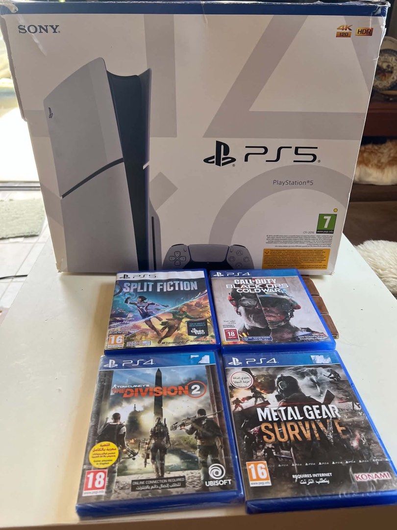 Sony PlayStation 5 Console with 2 Controllers and Games (Category: PlayStation) located in Manila. Submitted by cjm00 (Listing ID 1470954340, Image 1). Description: - Sony PlayStation 5 console with original box - 2 DualSense controllers (White and Purple) - Power and HDMI cables included - 4 Physical games: Split Fiction, Call of Duty Black Ops Cold War, Tom Clancy's The Division 2, and Metal Gear Survive - Plug and play, everything pictured is 