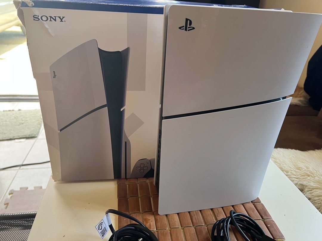 Sony PlayStation 5 Console with 2 Controllers and Games (Category: PlayStation) located in Manila. Submitted by cjm00 (Listing ID 1470954340, Image 3). Description: - Sony PlayStation 5 console with original box - 2 DualSense controllers (White and Purple) - Power and HDMI cables included - 4 Physical games: Split Fiction, Call of Duty Black Ops Cold War, Tom Clancy's The Division 2, and Metal Gear Survive - Plug and play, everything pictured is 