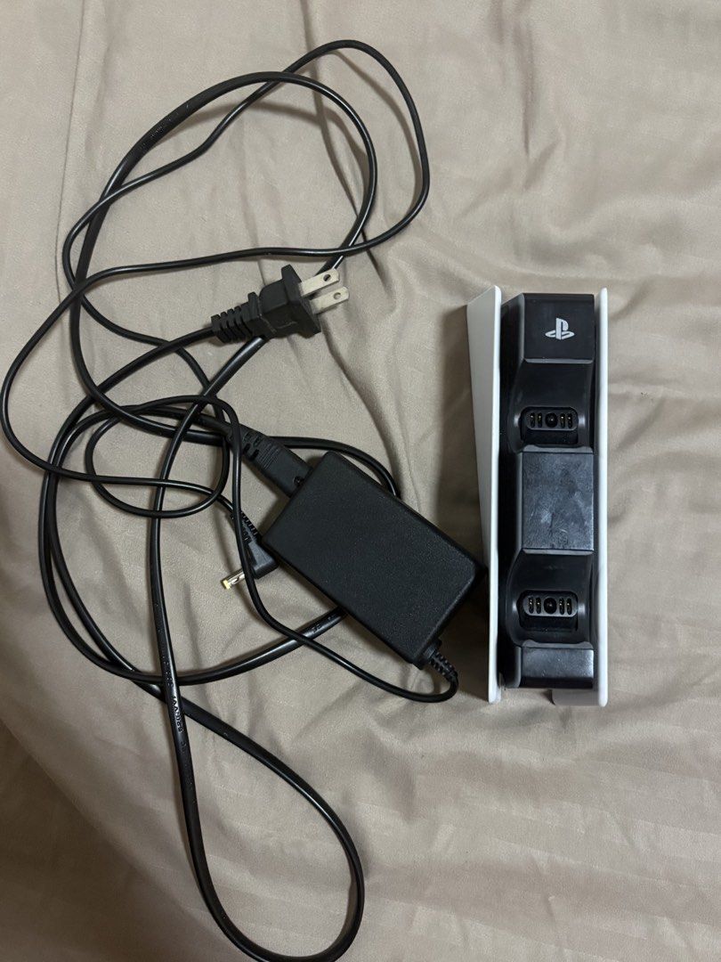 Sony PlayStation 5 DualSense Charging Station (Category: PlayStation) located in Manila. Submitted by arciagarc (Listing ID 1471014205, Image 1). Description: - Official Sony PlayStation 5 DualSense charging station - Charges up to two controllers at the same time with box .
