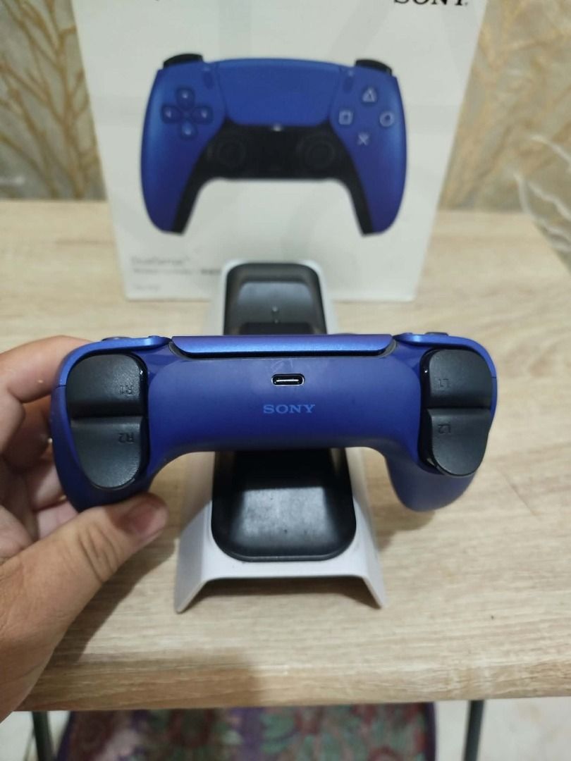 Sony PlayStation 5 DualSense Wireless Controller Starlight Blue (Category: Controllers) located in Paranaque City. Submitted by thebiskwitcompany (Listing ID 1470984914, Image 3). Description: #57 Dual Sense 5 Controller P2595 -Unit only wih box -Very Good Condition with slight signs of usage sa back ng controller -no issue (ghost movement, buttons, wireless, battery) Compatible with PS5 and PC Shipping through grab/lalamove/jnt/lbc (COD/COP) Pic