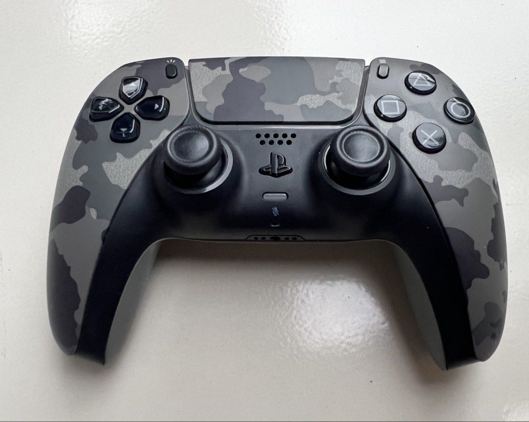 Sony PlayStation 5 DualSense Wireless Controller Gray Camouflage (Category: Controllers) located in Davao. Submitted by bnine.nine (Listing ID 1471046900, Image 1). Description: - Sony PS5 DualSense Wireless Controller - Gray Camouflage - USB-C charging port and bottom charging pins - In excellent condition.