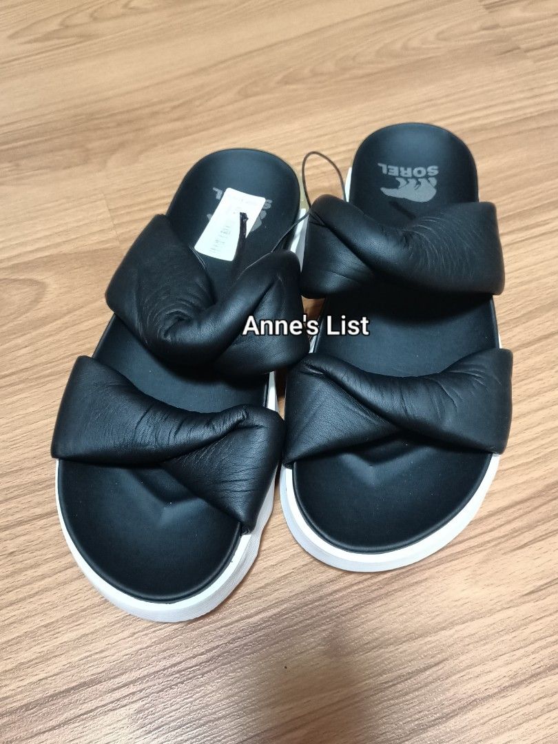 Sorel Viibe Twist Slide Strap Sandals Size 10 (Category: Flats & Sandals) located in Santa Maria. Submitted by anne_s.list (Listing ID 1471018334, Image 1). Description: Sorel ( black/Seas Salt) sandals in size 10. Chunky puffed straps across the top, very stylish and comfortable. White and pale green platform sole with Sorel branding on the heel. Brown rubber outsole with grip. Clean soles, never worn outside..