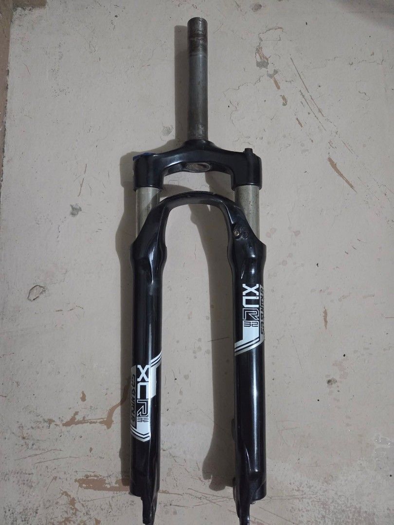 SR Suntour XCR 32 Suspension Fork (Category: Bicycles) located in Manila. Submitted by elizer_tiger (Listing ID 1471051690, Image 1). Description: - Model: SR Suntour XCR 32 suspension fork - Color: Black lowers, silver stanchions, white branding - Condition: Decent working order, pulled from a project build - Cosmetic: Normal trail scuffs on lowers; clean stanchions with no major scratches - Steerer Tube: Standard steerer tube attached - 27.5 - 