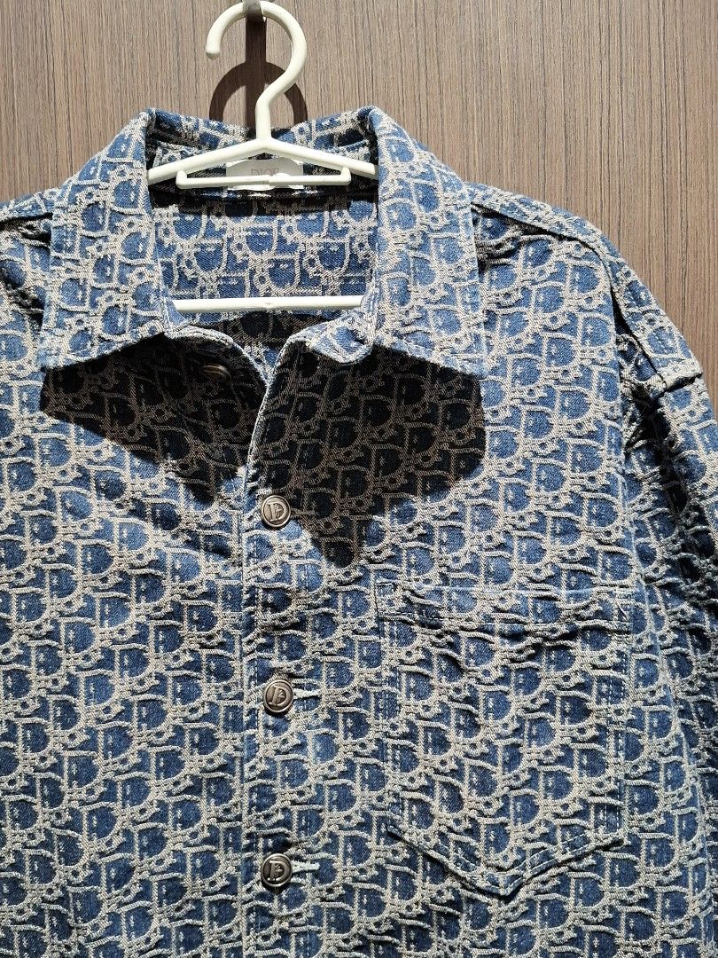 SS21 Dior Oblique Monogram Denim Jacket (Category: Coats, Jackets and Outerwear) located in Pasig City. Submitted by coveted.mnl (Listing ID 1471026860, Image 2). Description: In Pristine Condition📌 All buttons on iconic Dior Bee Logo~ Best fit to: Large Width : 21 Length : 25 (MEASURED BY INCHES) 9.5/10 overall condition No issues or flaws in fabric Retailed for $2,650 (P169,600) • P2,400 Slightly negotiable • Pasig City meet up • Open for COD 
