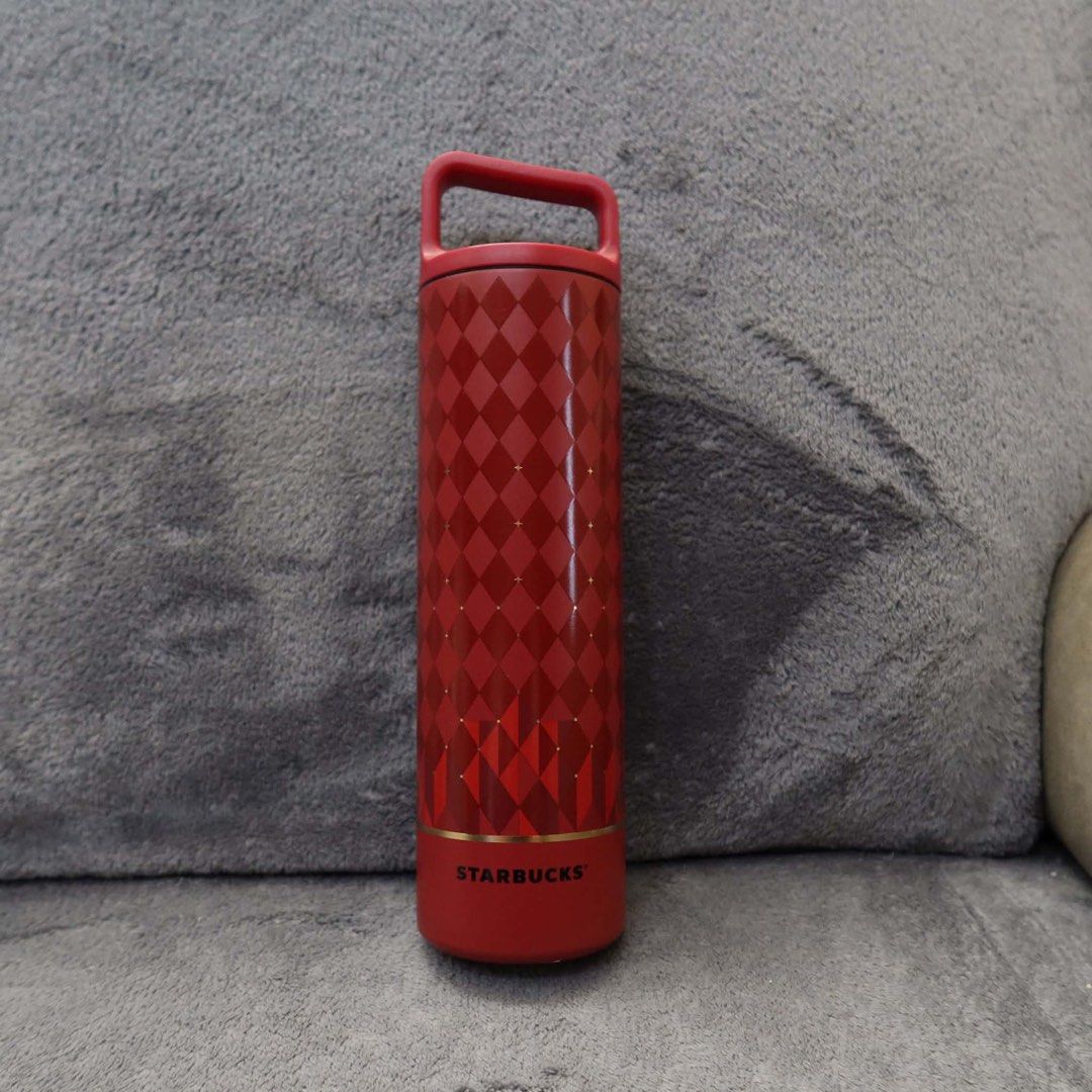 Starbucks x MiiR Red Argyle Pattern Insulated Tumbler (Category: Water Bottles & Tumblers) located in Manila. Submitted by mixi_lexi (Listing ID 1471079093, Image 1). Description: - Authentic Starbucks x MiiR collaboration water bottle - Vibrant red exterior featuring a geometric argyle pattern and elegant gold accents - Dual branding: Starbucks logo on one side, MiiR logo on the other - Twist-off cap with a convenient built-in red handle - Durab