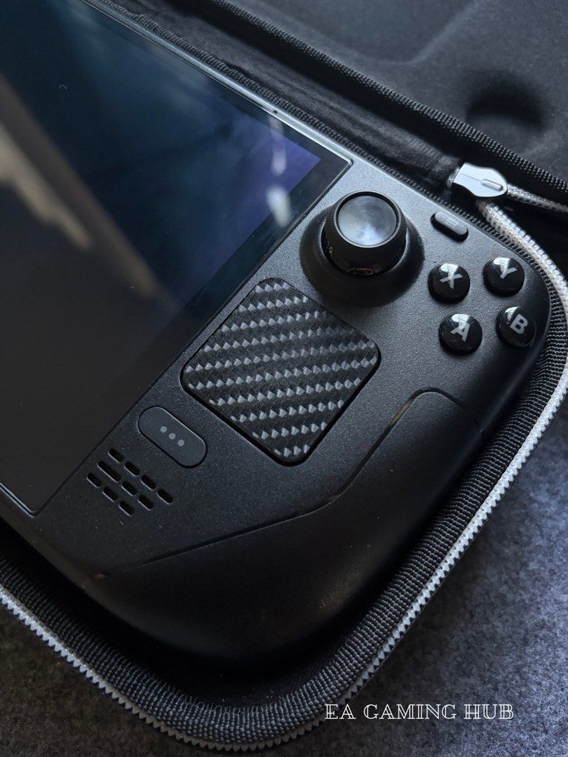Steamdeck Oled 1TB Variant(100 bh)(full of Games) (Category: Others) located in Manila. Submitted by eagaminghub (Listing ID 1471062607, Image 3). Description: For Sale or Swap Steamdeck Oled 1TB Variant (Full of Games)(100% Battery Health)👾 For Only 40k Feel free to visit our page EA Gaming Hub Swapping value: 43k Pwede Swap sa Nintendo switch oled and switch 2, ps5, Steamdeck Lcd, and Rog ally z1 extreme Inclusion - Unit - Orig Charger - Box -