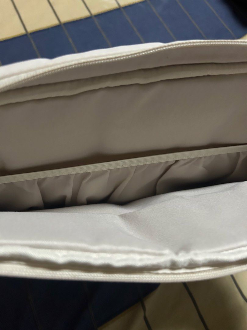 Straightforward 16 inch laptop sleeve (Category: Laptop Bags & Sleeves) located in Manila. Submitted by vasthorse-11b538 (Listing ID 1471065315, Image 3). Description: - Brand: Marta laptop sleeve - Color: NR chai - Design: Chic quilted exterior with a secure zippered top - Interior: Soft inner lining with an accessory pocket and elastic band - Condition: Brand new with label attached in original protective plastic packaging.