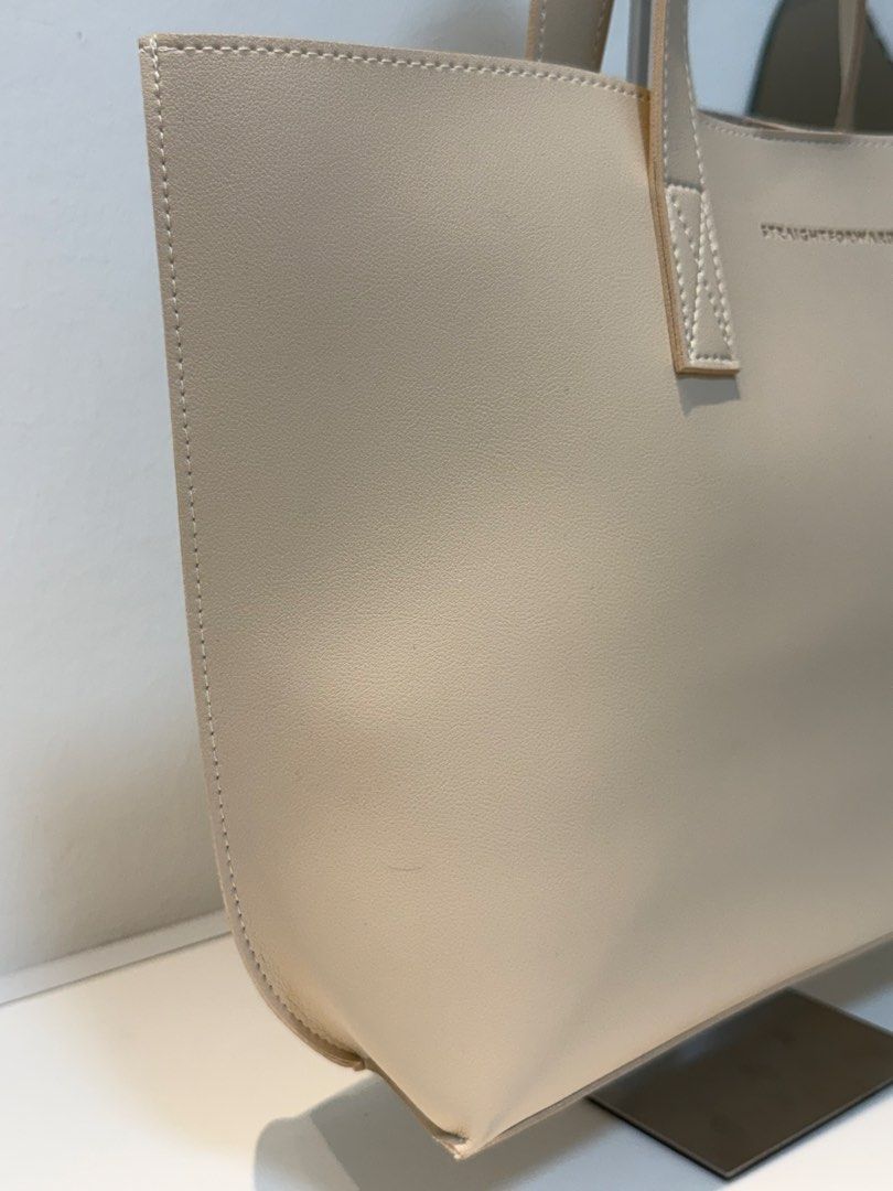 Straightforward Boundless Basics Tote Bag (Category: Tote Bags) located in Marikina City. Submitted by ms.ces (Listing ID 1471005158, Image 3). Description: - Brand: Straightforward - Color: Sand (Neutral shade) - Condition: Brand new with tag still attached - Design: Clean, minimal aesthetic with dual shoulder straps - Durability: Reinforced stitching at the base of handles - Capacity: Roomy interior, ideal for daily commute, work, or school ess
