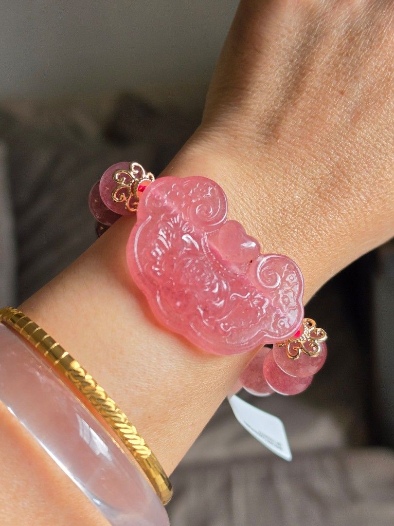 Strawberry quartz with Ruyi Lotus charm (Category: Bracelets) located in Manila. Submitted by cavalierdolls (Listing ID 1470958600, Image 2). Description: Strawberry quartz with Ruyi carving Lotus flower charm. 12mm.