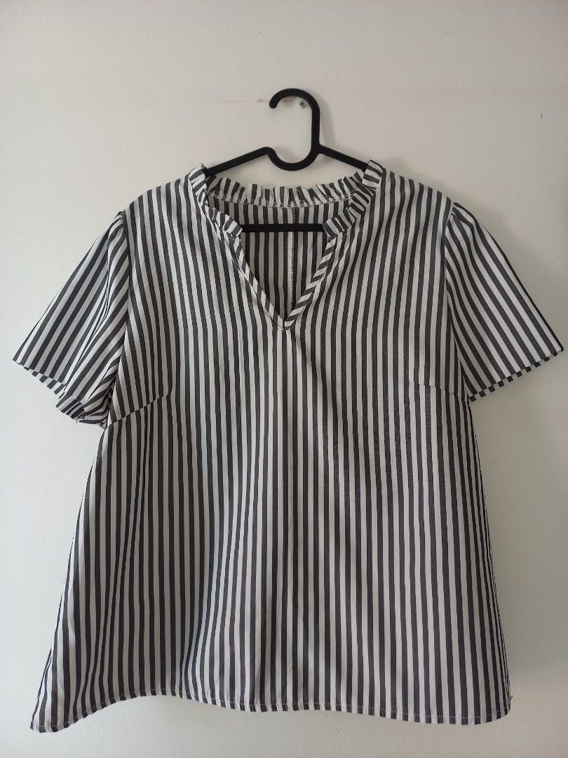 Striped v-neck blouse (Category: Blouses) located in San Pedro. Submitted by ceratopogonidae (Listing ID 1470965541, Image 1). Description: Best fit L-XL or those with big bust. Office wear, with minor issue (see photo, not holes).