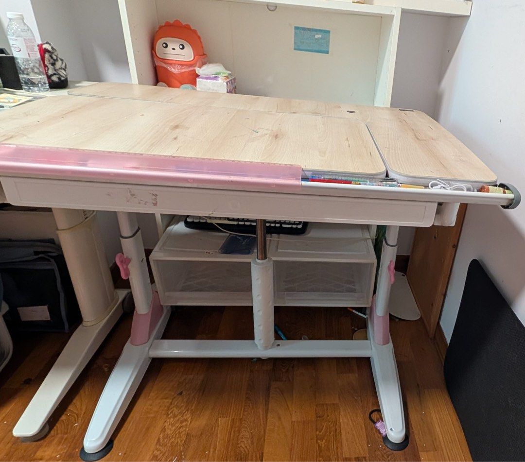 Study table (Category: Tables & Sets) located in Singapore. Submitted by lynpek (Listing ID 1471055756, Image 3). Description: - negotiable - White plastic pull-out drawer for study or office desks - adjustable angle for desired comfort - Built-in compartments for stationery and small items - Larger flat section on the right for bigger accessories - Slides out smoothly and functions perfectly - Minor light stains and dust inside due to regular us