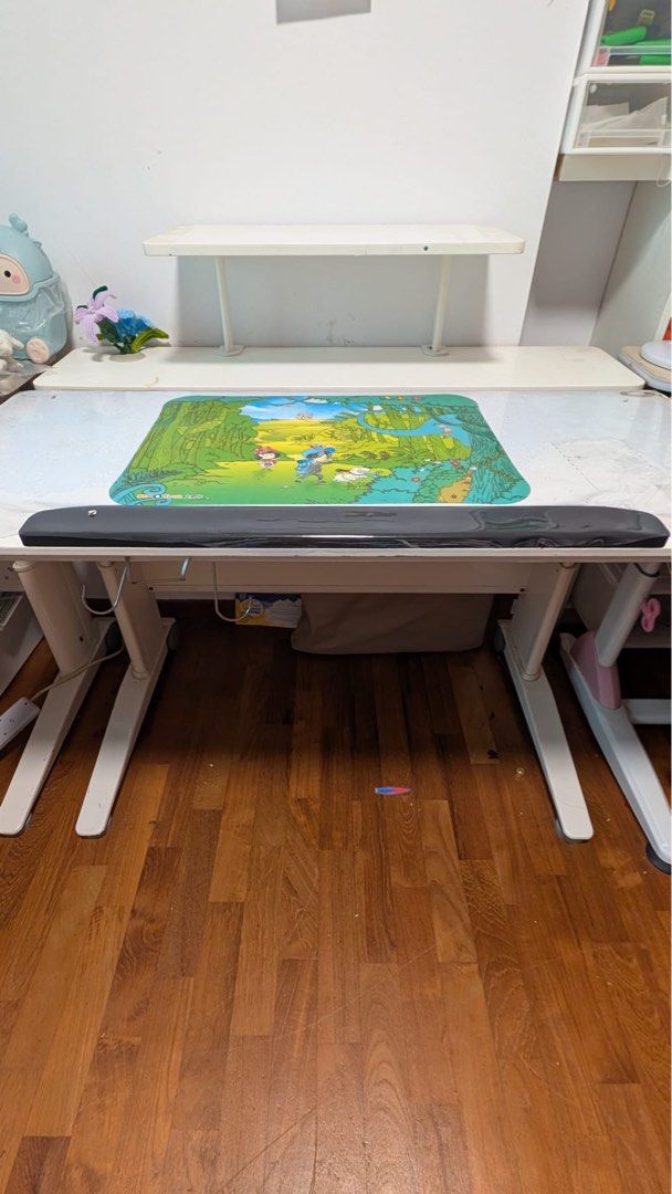 Study table (Category: Tables & Sets) located in Singapore. Submitted by lynpek (Listing ID 1471055756, Image 2). Description: - negotiable - White plastic pull-out drawer for study or office desks - adjustable angle for desired comfort - Built-in compartments for stationery and small items - Larger flat section on the right for bigger accessories - Slides out smoothly and functions perfectly - Minor light stains and dust inside due to regular us