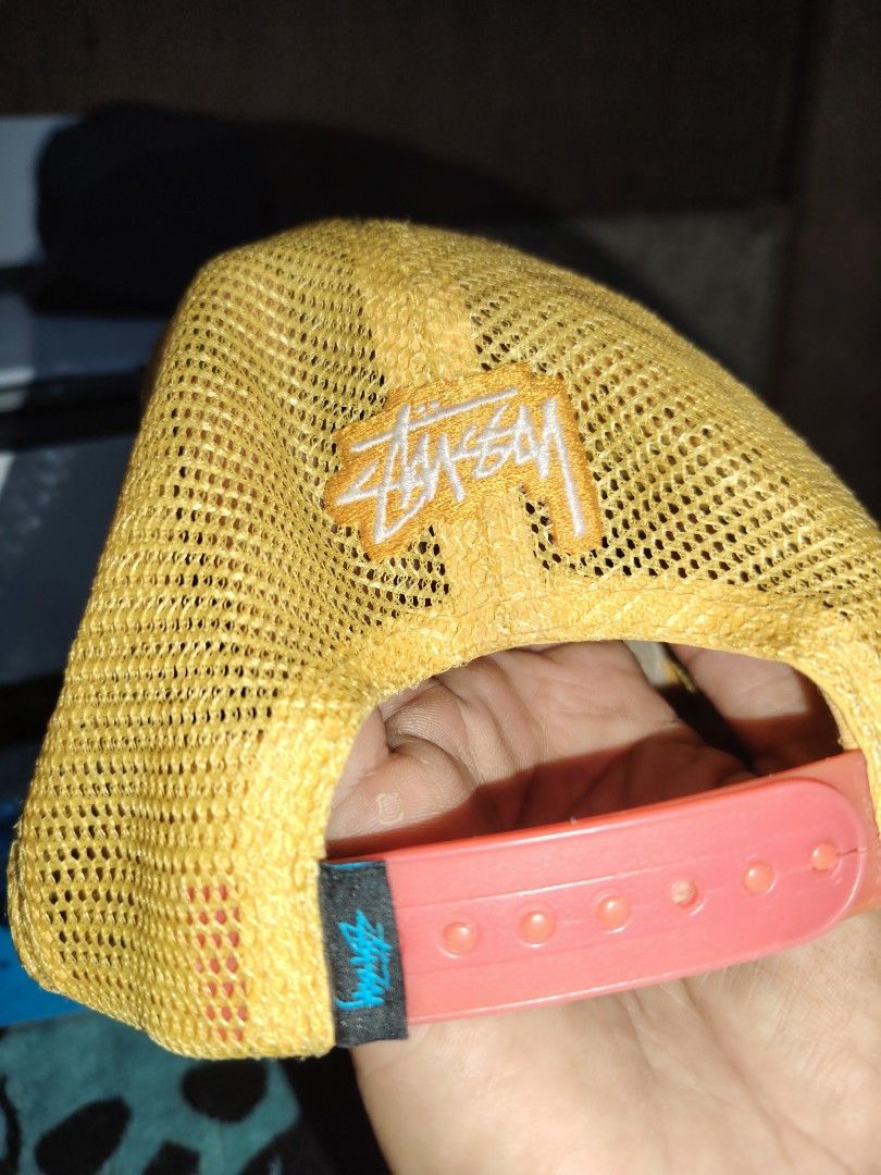 Stussy N4 Snoopy Trucker Cap Yellow (Category: Caps & Hats) located in Roxas, Palawan. Submitted by act_thrift_palawan (Listing ID 1471042079, Image 2). Description: Youth size - Authentic Stussy trucker cap in a vibrant bright yellow colorway - Eye-catching front panel featuring the N°4 graphic with Snoopy lounging - Matching yellow mesh back panels for breathability - Embroidered Stussy logo positioned right above the snapback closure - Contras