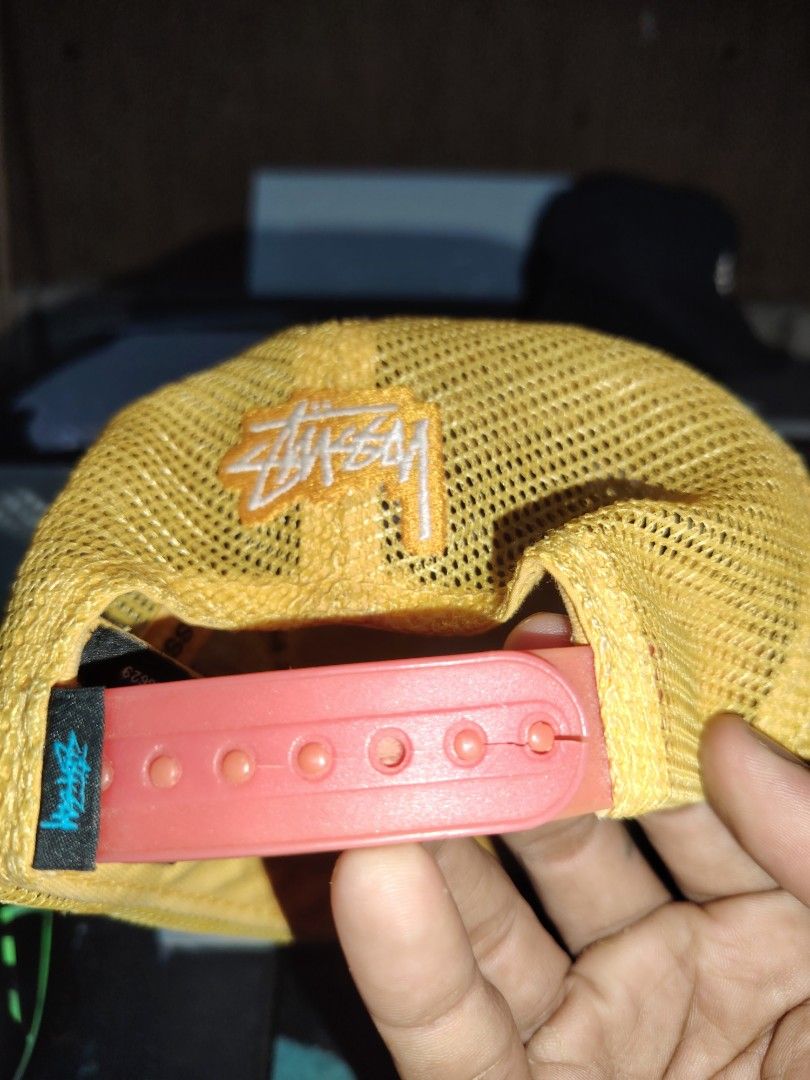 Stussy N4 Snoopy Trucker Cap Yellow (Category: Caps & Hats) located in Roxas, Palawan. Submitted by act_thrift_palawan (Listing ID 1471042079, Image 3). Description: Youth size - Authentic Stussy trucker cap in a vibrant bright yellow colorway - Eye-catching front panel featuring the N°4 graphic with Snoopy lounging - Matching yellow mesh back panels for breathability - Embroidered Stussy logo positioned right above the snapback closure - Contras