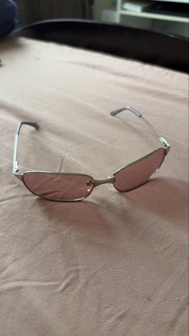 Sunnies Studios Aspen Silver Lychee Sunglasses (Category: Sunglasses & Eyewear) located in Mandaluyong City. Submitted by andreyamari_ (Listing ID 1470944448, Image 3). Description: - Brand: Sunnies Studios - Model: Aspen - Frame: Silver rectangular metal frame (Y2K aesthetic) - Lenses: Lychee pink tinted, clean condition - Condition: Barely worn, like new .