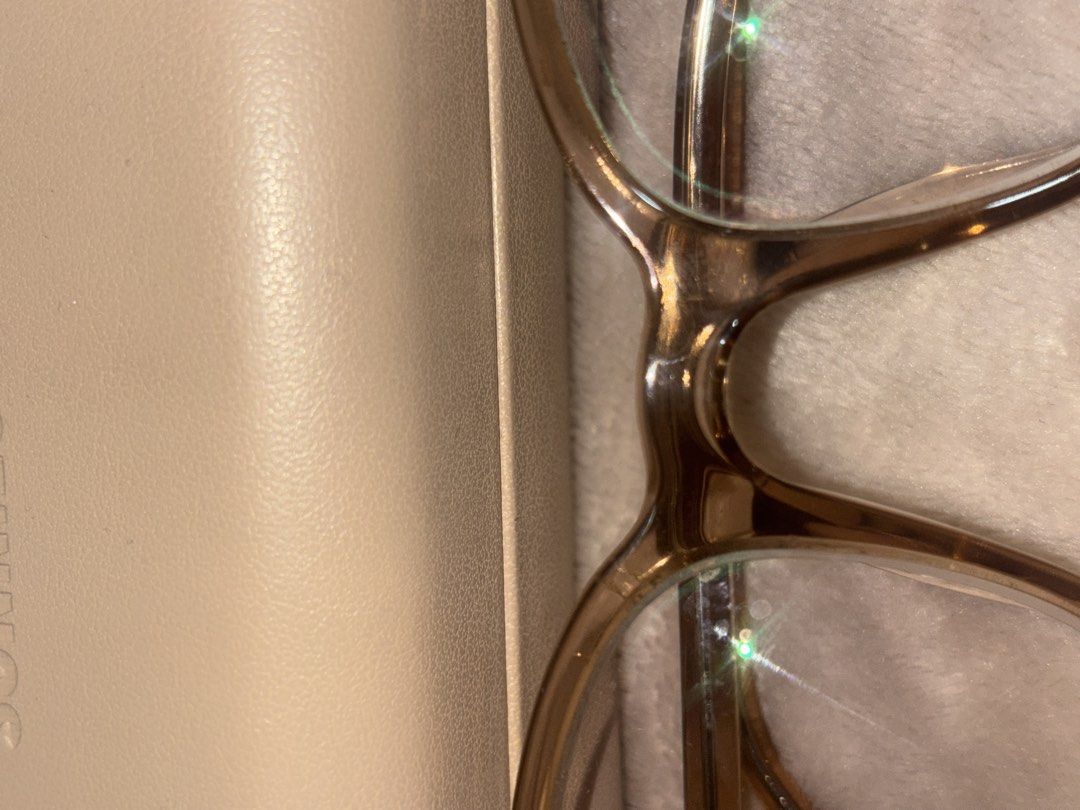 Sunnies Studios Eyeglasses with Case (KENT) (Category: Sunglasses & Eyewear) located in Manila. Submitted by bellsellsss (Listing ID 1470976849, Image 2). Description: - Frame Style: Square shape in a stylish brown translucent color - Versatile Use: Ideal for everyday prescription lenses or blue light blocking - Included: Original beige hard case with brand logo - Condition: Excellent daily wear frames.