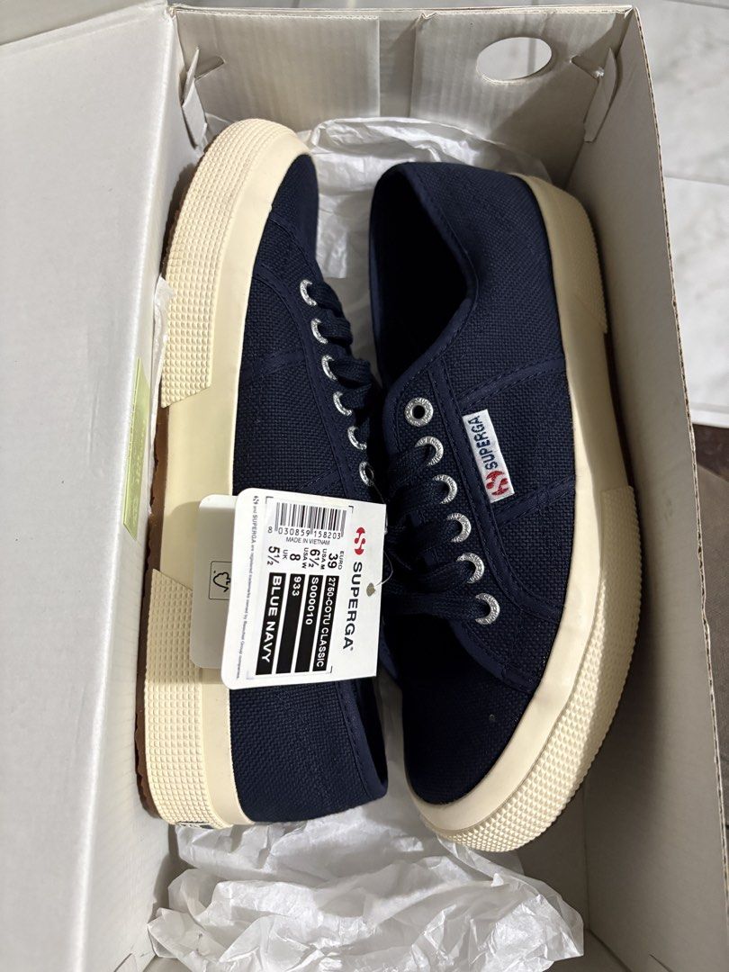 Superga 2750 Cotu Classic Blue Navy Sneakers (Category: Sneakers) located in Manila. Submitted by geminisznforeva (Listing ID 1471060468, Image 1). Description: - Brand: Superga 2750 Cotu Classic - Color: Navy Blue - Condition: Brand new with tag and barcode attached - Packaging: Original shoebox included - Material: Classic canvas upper with vulcanized rubber sole - Size 39, US 8 W, US 6.5 M - RFS: Gift, Wrong Size - Still Negotiable.