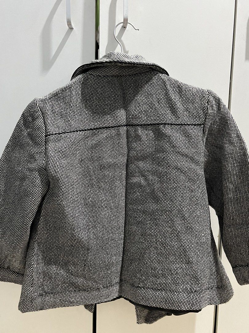 Suzuya Black And White Tweed Pattern Coat Size M (Category: Coats, Jackets and Outerwear) located in Caloocan City. Submitted by decluttering.101_ (Listing ID 1471038186, Image 3). Description: - Brand: Suzuya - Size: M - Pattern/Color: Black and white tweed - Details: Structured collar with dark piping, patterned black buttons, and two front patch pockets - Lining: Fully lined with smooth black interior fabric - Style: Classic winter outerwear p