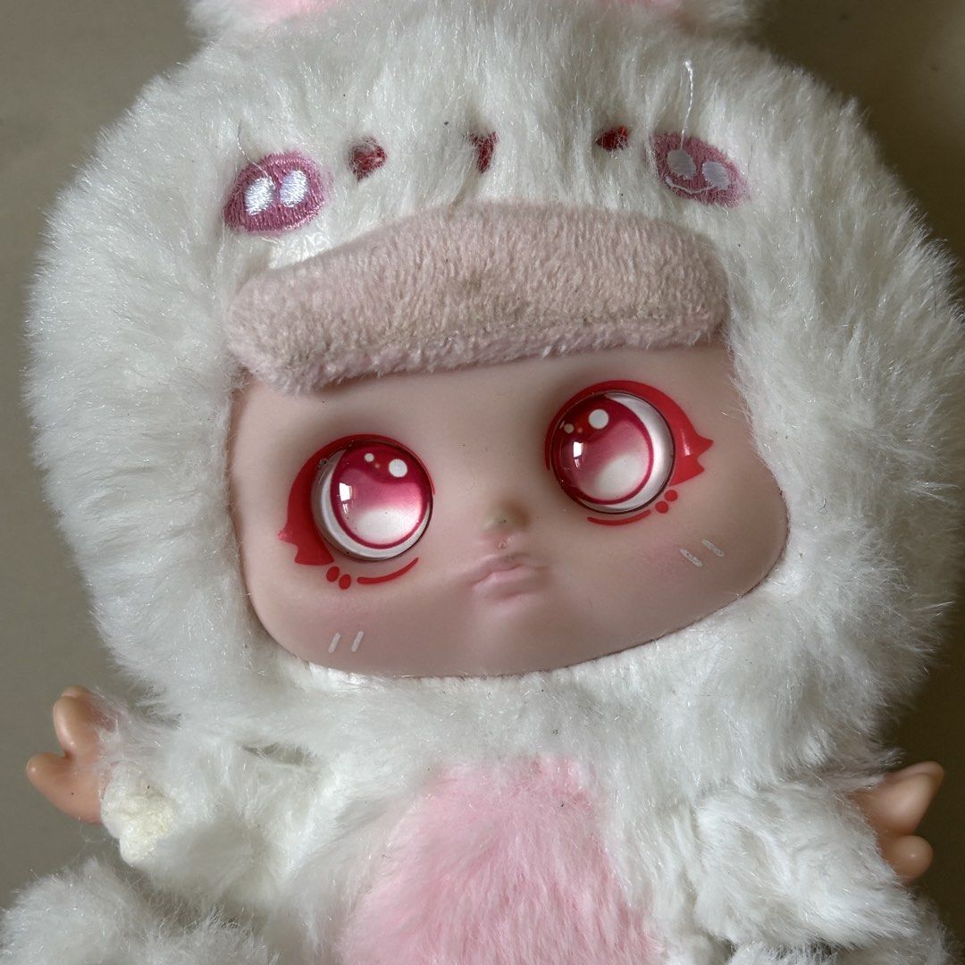 take all 150 (Category: Designer & Blind Box Toys) located in Manila. Submitted by lavieelle (Listing ID 1470955040, Image 3). Description: - nooki zoo party little rabbit and collectible bonana green dinosaur hoodie plushie with button eyes and a soft-vinyl face - fluffy white & pink plushie from blind box - toy city: Mr. Pa - Animal Co plush blind box - rfs: decluttering .