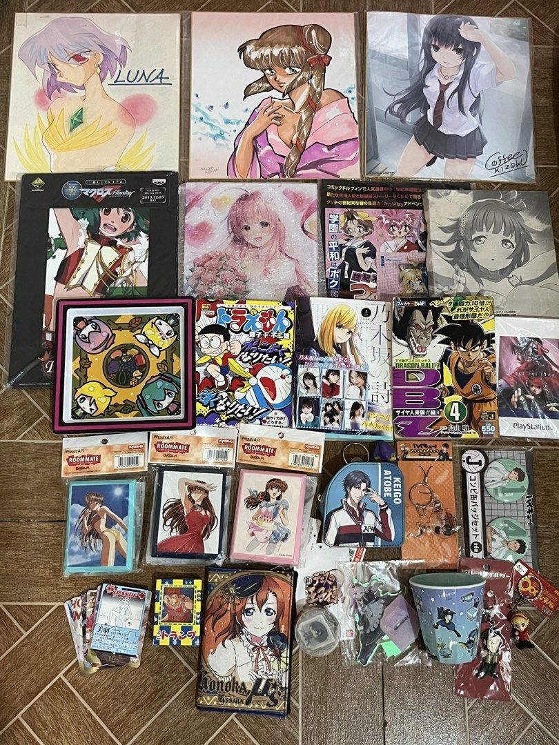 Take All Assorted Anime Merchandise Collection Lot (Category: Designer & Blind Box Toys) located in Gapan. Submitted by lunashop14 (Listing ID 1471089606, Image 1). Description: Massive collection of anime and manga goods. Includes art prints, Dragon Ball Z and Doraemon books, Pokémon cup, trading card games, card sleeves, keychains, pins, and pouches from various series like Prince of Tennis and Haikyuu. Variety of items, mostly unopened or in p